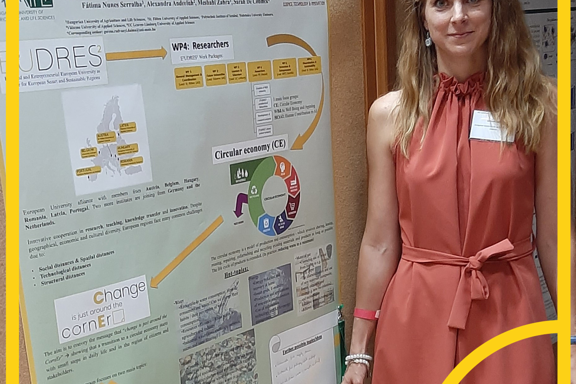 People walking through a bright indoor hallway with glass walls and shops.