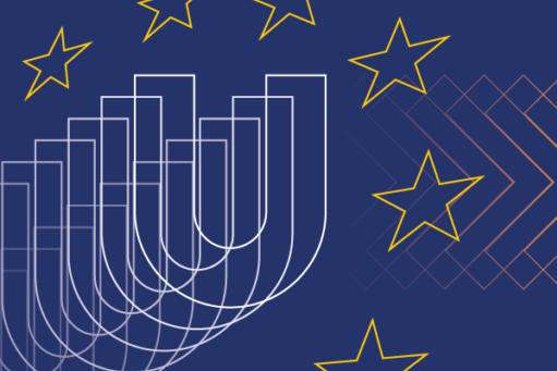 People walking through a bright indoor hallway with glass walls and shops.