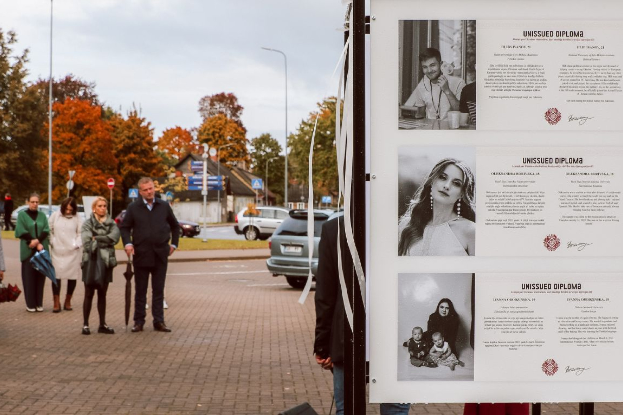 Visitors at the Unissued Diplomas Exhibition.